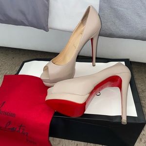 Christian Louboutins Nude Platform Peep Toe